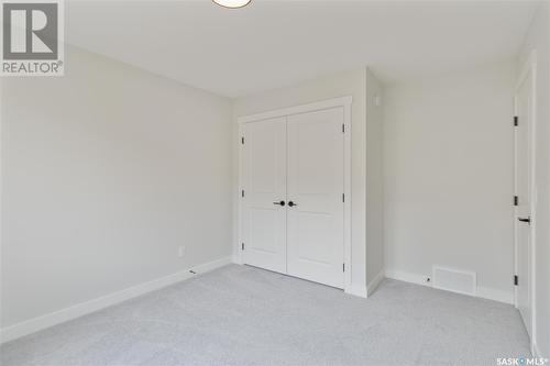 115 Woolf Bend, Saskatoon, SK - Indoor Photo Showing Other Room