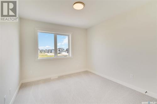 115 Woolf Bend, Saskatoon, SK - Indoor Photo Showing Other Room