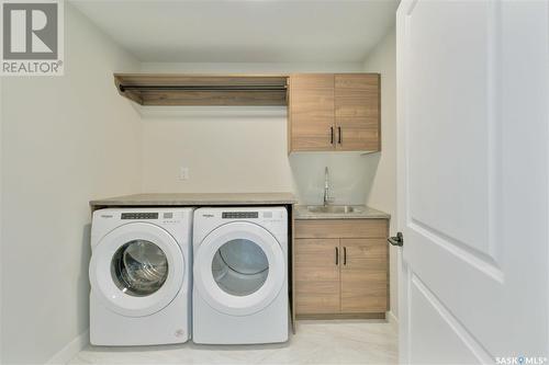 115 Woolf Bend, Saskatoon, SK - Indoor Photo Showing Laundry Room