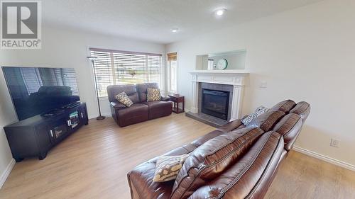 11419 96A Street, Fort St. John, BC - Indoor Photo Showing Living Room With Fireplace