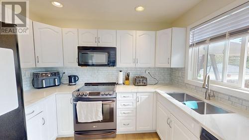 11419 96A Street, Fort St. John, BC - Indoor Photo Showing Kitchen With Double Sink With Upgraded Kitchen