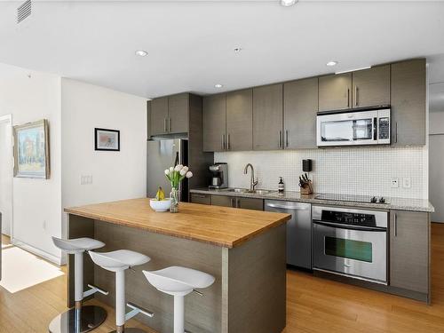 404-391 Tyee Rd, Victoria, BC - Indoor Photo Showing Kitchen With Stainless Steel Kitchen With Upgraded Kitchen