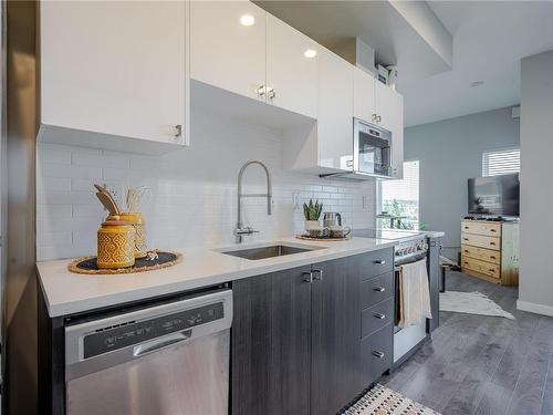 406-767 Tyee Rd, Victoria, BC - Indoor Photo Showing Kitchen With Upgraded Kitchen