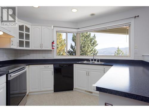 4074 Gellatly Road Unit# 233, West Kelowna, BC - Indoor Photo Showing Kitchen With Double Sink