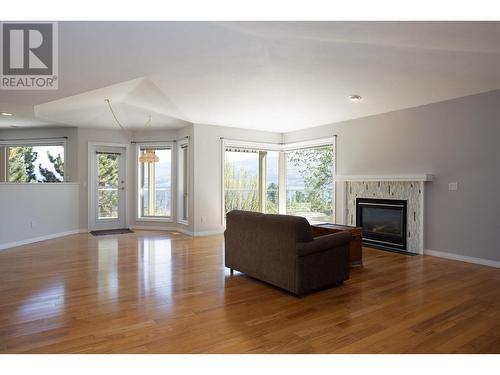 4074 Gellatly Road Unit# 233, West Kelowna, BC - Indoor Photo Showing Living Room With Fireplace