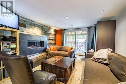 111 Holmcrest Trail, Toronto, ON - Indoor Photo Showing Living Room With Fireplace