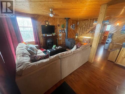 2 Beaver Cove, Point Of Bay, NL - Indoor Photo Showing Other Room With Fireplace