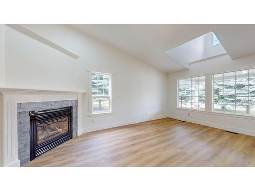 2739 Huckleberry Lane, Kimberley, BC - Indoor Photo Showing Living Room With Fireplace