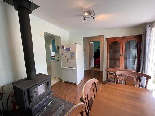 1309 Fir Ave, Merritt, BC - Indoor Photo Showing Dining Room With Fireplace