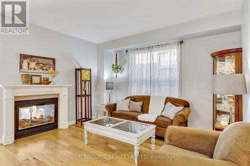 2530 Cunningham Boulevard, Peterborough, ON - Indoor Photo Showing Living Room With Fireplace