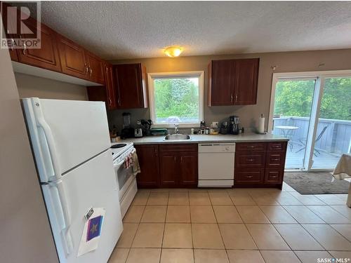 234 Cockburn Crescent, Saskatoon, SK - Indoor Photo Showing Kitchen With Double Sink