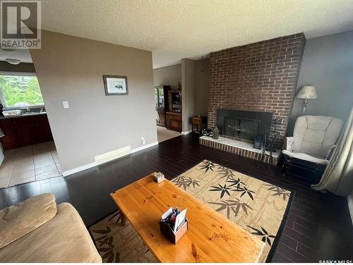 234 Cockburn Crescent, Saskatoon, SK - Indoor Photo Showing Living Room With Fireplace