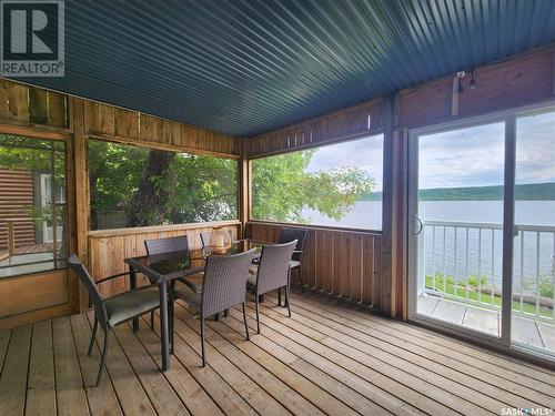 121 Currie Avenue, Round Lake, SK -  With Body Of Water With Deck Patio Veranda With Exterior