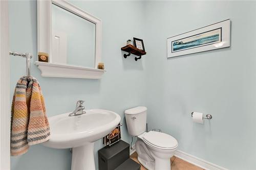 And main floor 2-piece bathroom - 2 Hewitt Drive, Grimsby, ON - Indoor Photo Showing Bathroom