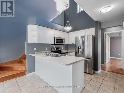 3 - 764 Neighbourhood Circle, Mississauga, ON - Indoor Photo Showing Kitchen With Double Sink