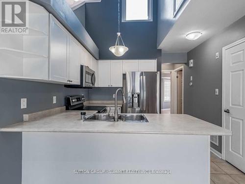 3 - 764 Neighbourhood Circle, Mississauga, ON - Indoor Photo Showing Kitchen With Double Sink