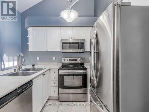 3 - 764 Neighbourhood Circle, Mississauga, ON - Indoor Photo Showing Kitchen With Double Sink