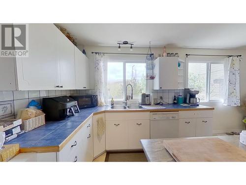 10211 103 Avenue, Fort St. John, BC - Indoor Photo Showing Kitchen With Double Sink