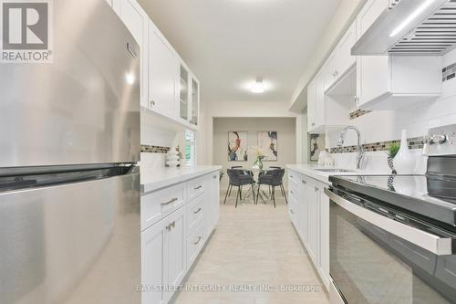 14 Scarfair Pathway, Toronto, ON - Indoor Photo Showing Kitchen With Upgraded Kitchen