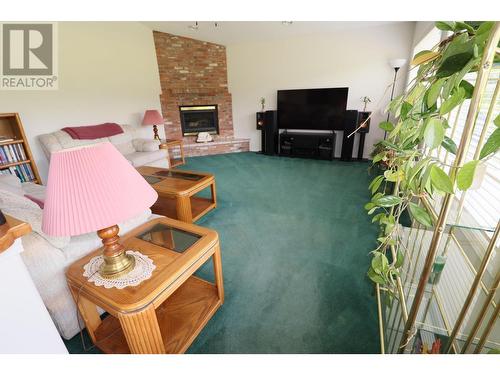 3185 Ward Road, Grand Forks, BC - Indoor Photo Showing Other Room With Fireplace