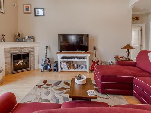 302-751 Goldstream Ave, Langford, BC - Indoor Photo Showing Living Room With Fireplace