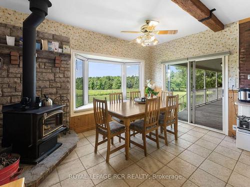 4962 Third Line, Erin, ON - Indoor Photo Showing Dining Room With Fireplace