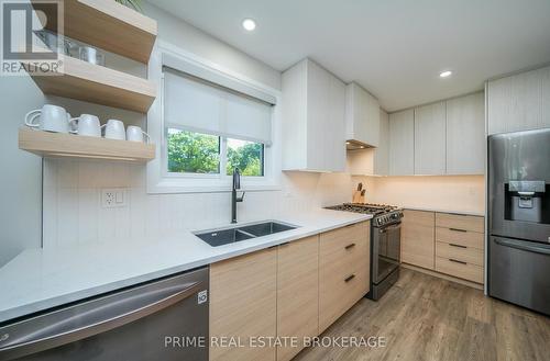 11 Eilber Street, Lambton Shores (Grand Bend), ON - Indoor Photo Showing Kitchen With Double Sink