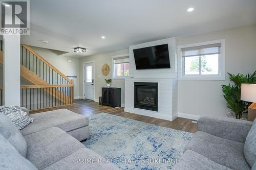 11 Eilber Street, Lambton Shores (Grand Bend), ON - Indoor Photo Showing Living Room With Fireplace