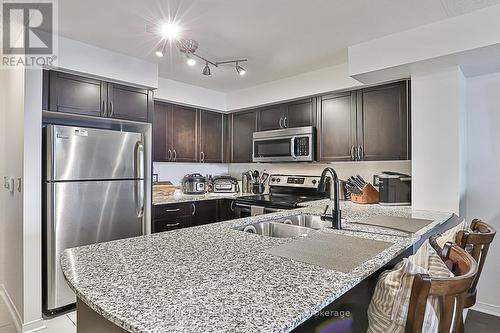 409 - 75 King William Crescent, Richmond Hill, ON - Indoor Photo Showing Kitchen With Double Sink With Upgraded Kitchen