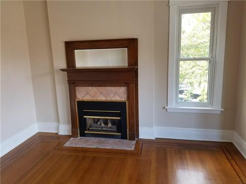 67 Holton Avenue S|Unit #2, Hamilton, ON - Indoor Photo Showing Living Room With Fireplace