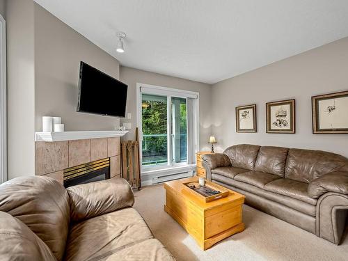 205-1340 Henry Rd, Courtenay, BC - Indoor Photo Showing Living Room With Fireplace