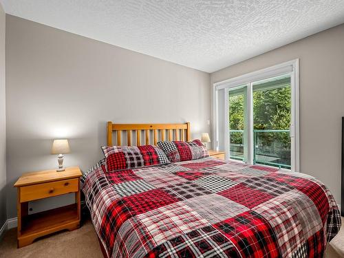 205-1340 Henry Rd, Courtenay, BC - Indoor Photo Showing Bedroom