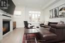 59 - 2092 Queensborough Gate, Mississauga (Central Erin Mills), ON  - Indoor Photo Showing Living Room With Fireplace 