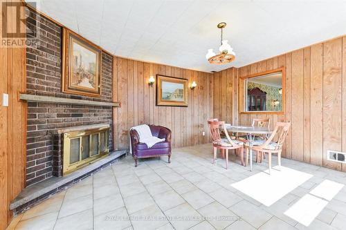 1482 Wilson Avenue, Toronto, ON - Indoor Photo Showing Dining Room With Fireplace