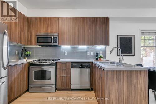 28 - 140 Broadview Avenue, Toronto, ON - Indoor Photo Showing Kitchen With Double Sink