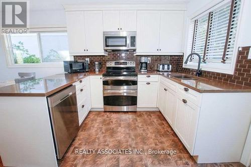 1737 Cedar Grove, Innisfil, ON - Indoor Photo Showing Kitchen With Double Sink