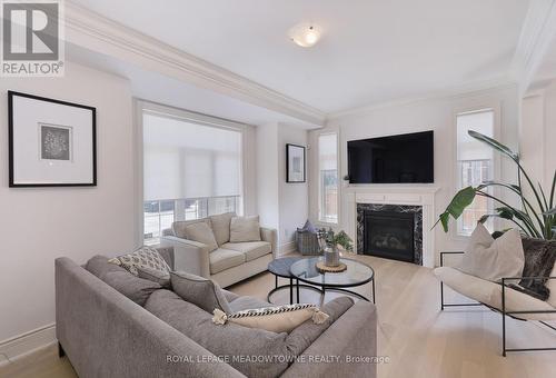 125 Burnhamthorpe Road E, Oakville, ON - Indoor Photo Showing Living Room With Fireplace