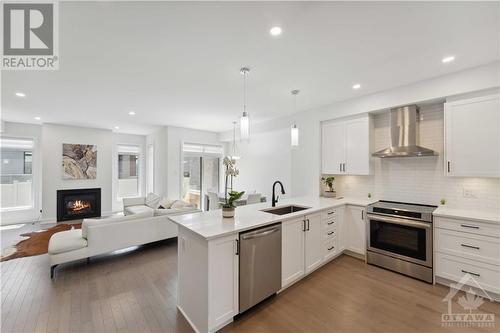 812 Atrium Ridge, Ottawa, ON - Indoor Photo Showing Kitchen With Fireplace With Upgraded Kitchen