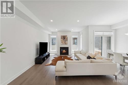 812 Atrium Ridge, Ottawa, ON - Indoor Photo Showing Living Room With Fireplace