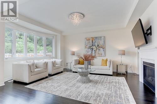 6 Taurus Crescent, East Gwillimbury, ON - Indoor Photo Showing Living Room With Fireplace