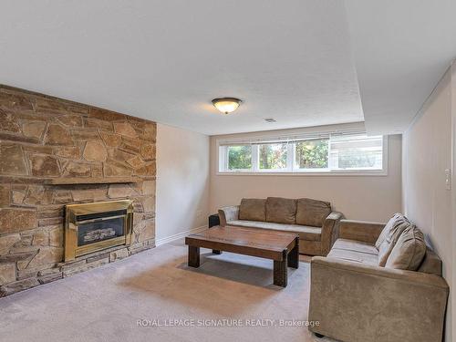 25 Burleigh Heights Dr, Toronto, ON - Indoor Photo Showing Living Room With Fireplace