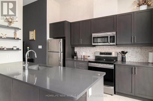 Apt 107 - 330 Titan Private, Ottawa, ON - Indoor Photo Showing Kitchen With Stainless Steel Kitchen With Upgraded Kitchen