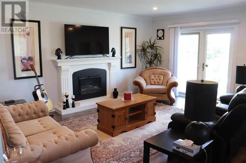 50 Front Road, Port Au Port West, NL - Indoor Photo Showing Living Room With Fireplace