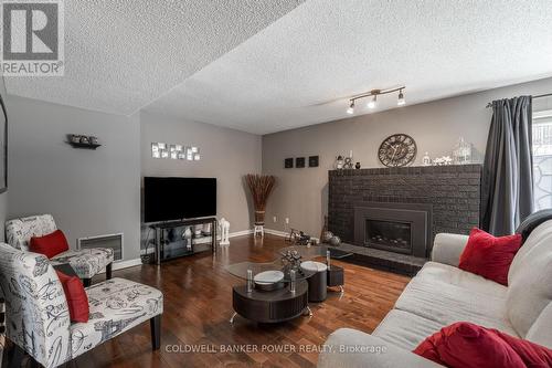 73 - 703 Windermere Road, London, ON - Indoor Photo Showing Living Room With Fireplace