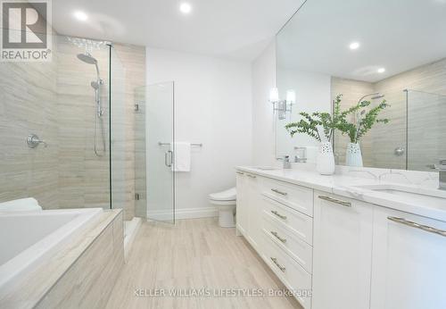 Upgraded fixtures and coni marble shower bases; - 1103 - 260 Villagewalk Boulevard, London, ON - Indoor Photo Showing Bathroom