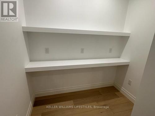 Pantry has been updated with custom shelving. - 1103 - 260 Villagewalk Boulevard, London, ON - Indoor With Storage