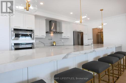 14X4 ft island with waterfall countertop - 1103 - 260 Villagewalk Boulevard, London, ON - Indoor Photo Showing Kitchen With Upgraded Kitchen