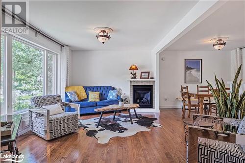 8 South Island Trail, Brechin, ON - Indoor Photo Showing Living Room With Fireplace