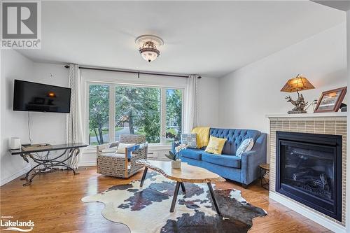 8 South Island Trail, Brechin, ON - Indoor Photo Showing Living Room With Fireplace