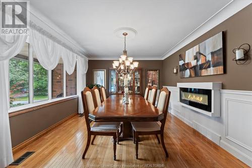 5735 Hastings, Lasalle, ON - Indoor Photo Showing Dining Room With Fireplace
